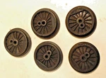Five Lionel Postwar Sinterered Iron Steam Engine Geared Wheels. Fixed Price $17.99.