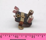 Lionel Part 2333-M-19 Brush Plate. Fixed Price $15.00.