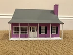 6-82009 Lionelville Scale Suburban House Purple Lighted. Fixed Price $40.00.