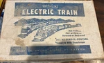 Vintage Marx Happy Time Electric Set (9 Trains, 2 Signs, & Original Box). Fixed Price $99.00.