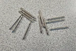 12 Pack Of Lionel OC-18 Steel Track Pins For Gauge Tubular Free Shipping. Fixed Price $8.25.