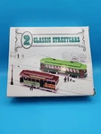 2 Classic Streetcars #1043834 - Desire Trolly & San Francisco Cable Nib. Fixed Price $10.85.