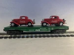 K-line K661-5108 Coca Cola Flat Car With Two 1934 Ford Window Coupes Gauge. Fixed Price $37.99.