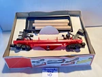 Lionel Trains O-27 #6-9310 Santa Fe Operating Log Dump Car Toy. Fixed Price $14.99.