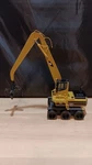 Norscot 1:50 Caterpillar W345B Axle Material Handler Diecast Model Is. Fixed Price $69.97.