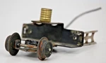 Lionel 1684-9 Front Truck Mount Bracket With Lamp, Pilot And X Head Guides. Fixed Price $16.99.