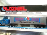 Lionel Visitor Center Die Cast Tractor & Trailer 6-12860 O27 Gauge Mib. Fixed Price $12.00.