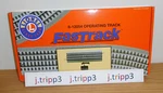 Lionel 6-12054 Fastrack Operating Gauge Train 10" Straight Remote. Fixed Price $46.95.