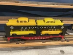 Rare* Postwar Lionel 6414 Auto Loader Yellow Cars Grey Bumper. Fixed Price $500.00.