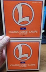 2) Lionel 6-12874 Classic Street Lamps 3 Per Box Used In Scale Total. Fixed Price $35.00.