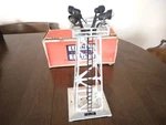 Lionel Postwar O-gauge No. 395 Aluminum Four-light Floodlight Tower W/box. Fixed Price $41.99.