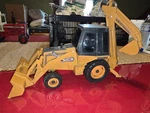 Ertl 1/16 Case 580E Construction King Backhoe Loader Tractor. Fixed Price $50.00.