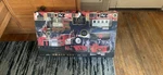 Fao Schwarz Motorized Train Set W/ Real Lights & Sounds 34-PIECE Christmas Decor. Fixed Price $150.00.