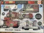 Fao Schwarz Holiday Train Motorized Track Set 30 Pieces With Light Sound. Fixed Price $50.00.