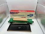 Lionel 9300 Penn Central Operating Log Dump Car - Banner Box. Fixed Price $23.74.